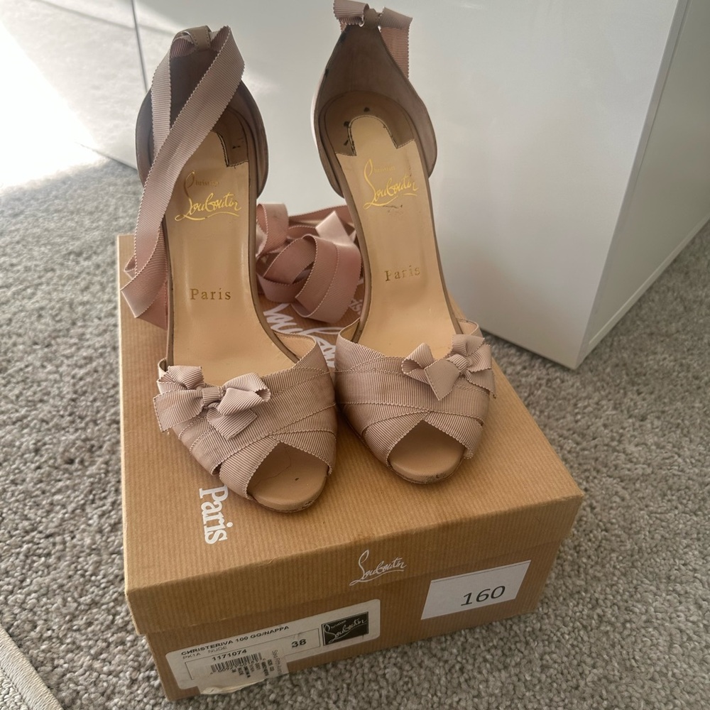 Christian Louboutin wrap around ankle shoes